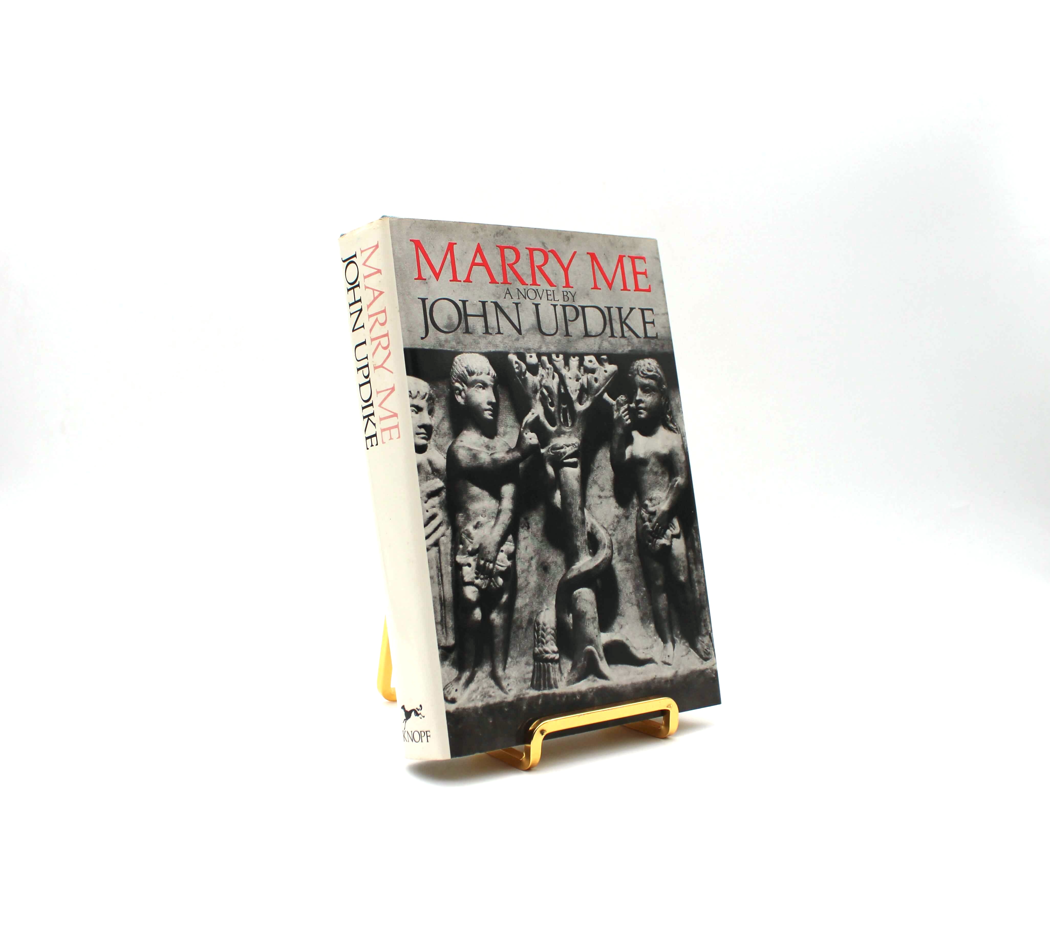Marry Me. Signed by John Updike. First Trade Edition, First Printing. Knopf. New York, 1976.
