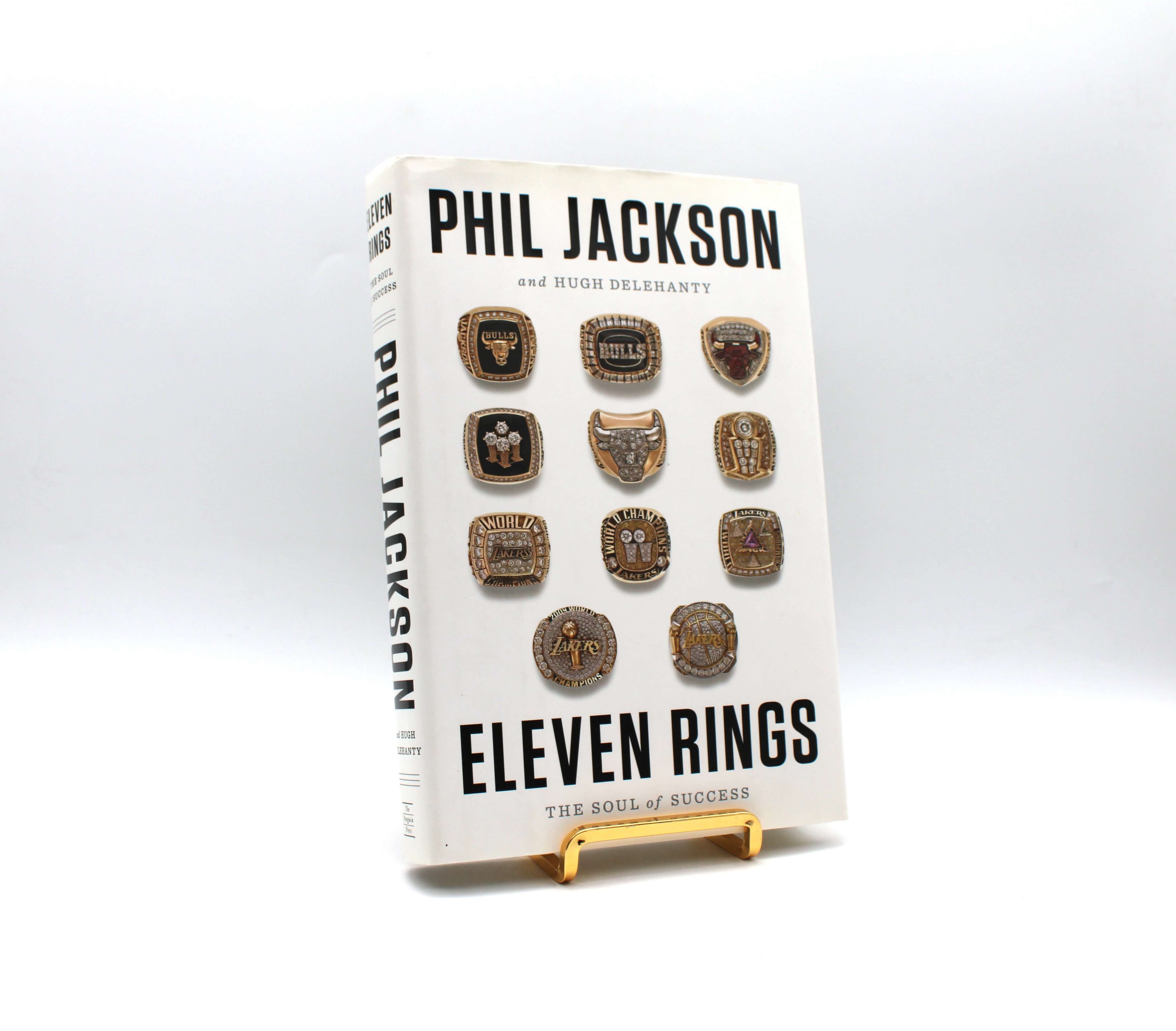 Eleven Rings. Signed by Phil Jackson. First Edition, First Printing. Penguin. New York, 2013.