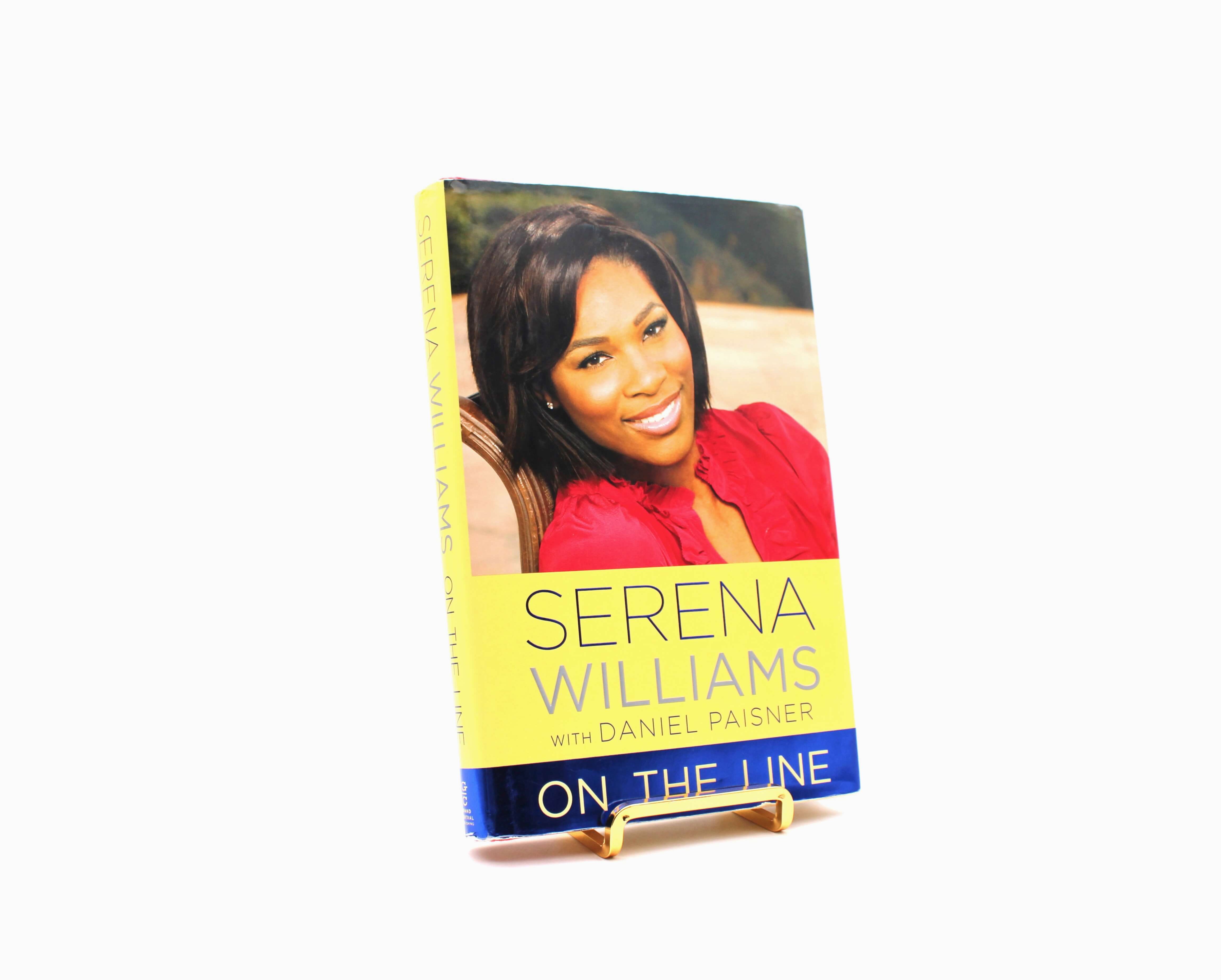 On the Line. Signed by Serena Williams. First Edition, First Printing. Grand Central Publishing. New York, 2009.
