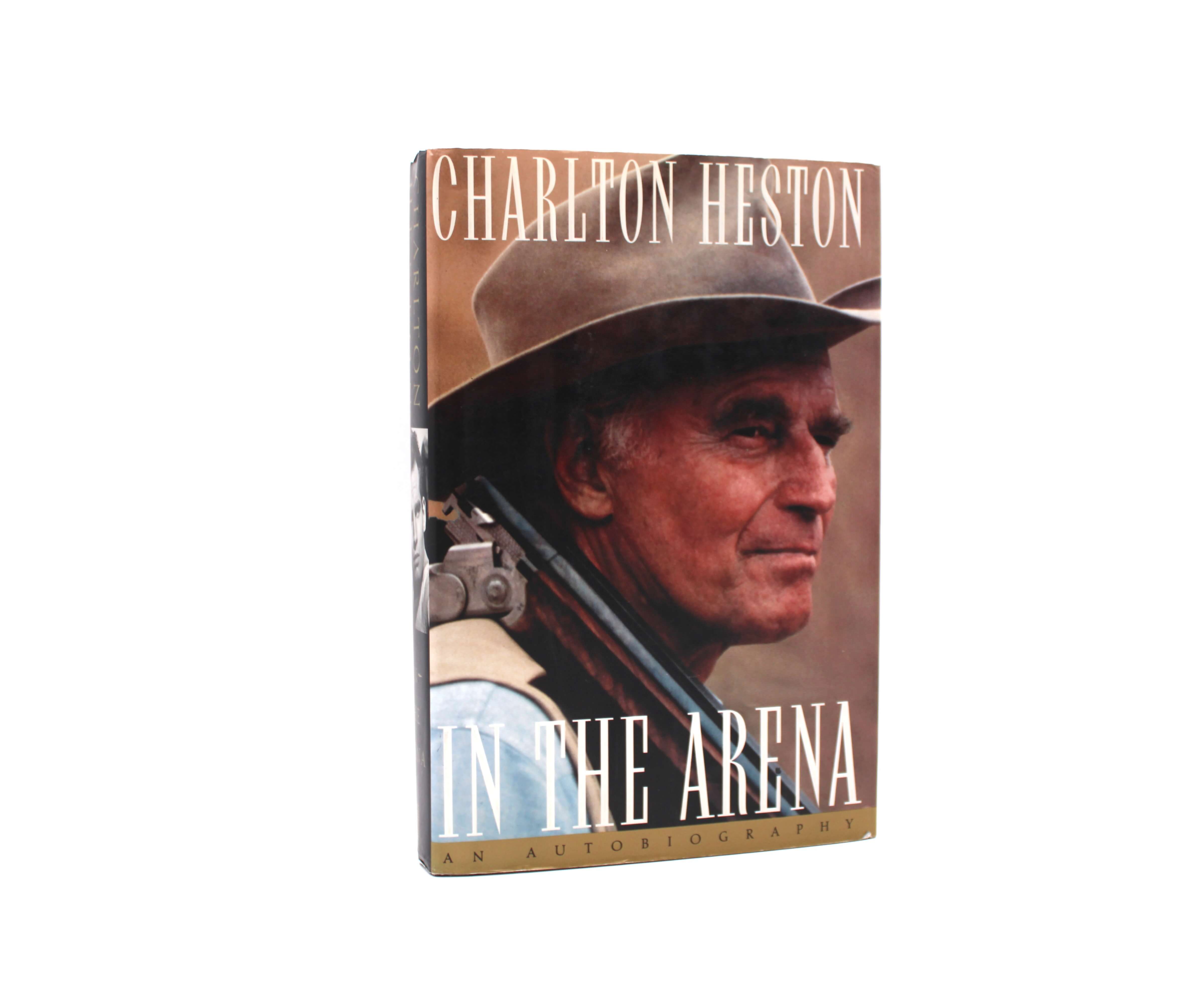 In the Arena. Signed by Charlton Heston. First Edition, First Printing. Simon & Schuster. New York, 1995.
