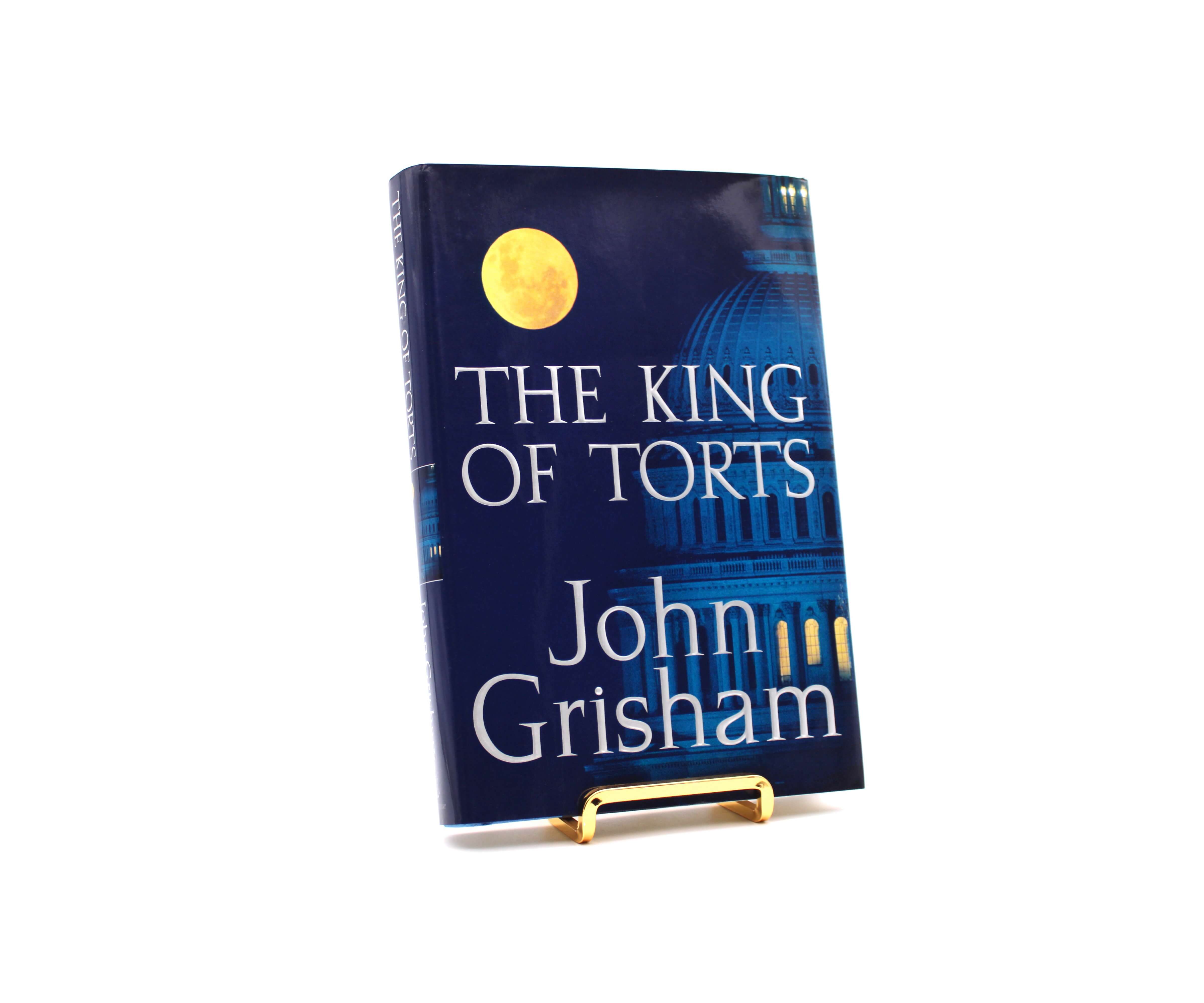 The King of Torts. Signed by John Grisham. First Trade Edition, First Printing. Doubleday. New York, 2003.