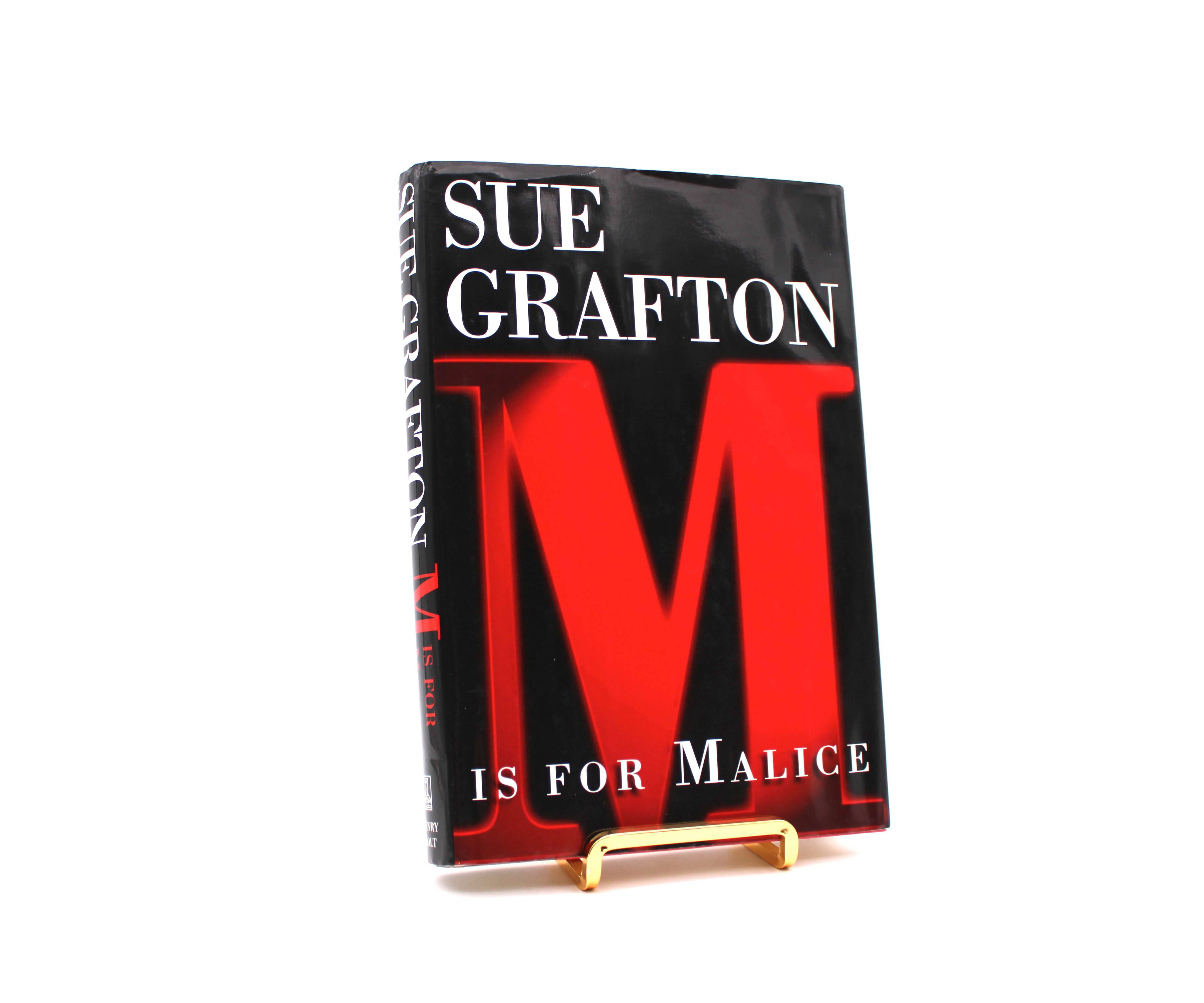 M Is for Malice. Signed by Sue Grafton. First Edition, First Printing. Henry Holt & Co. New York, 1996.